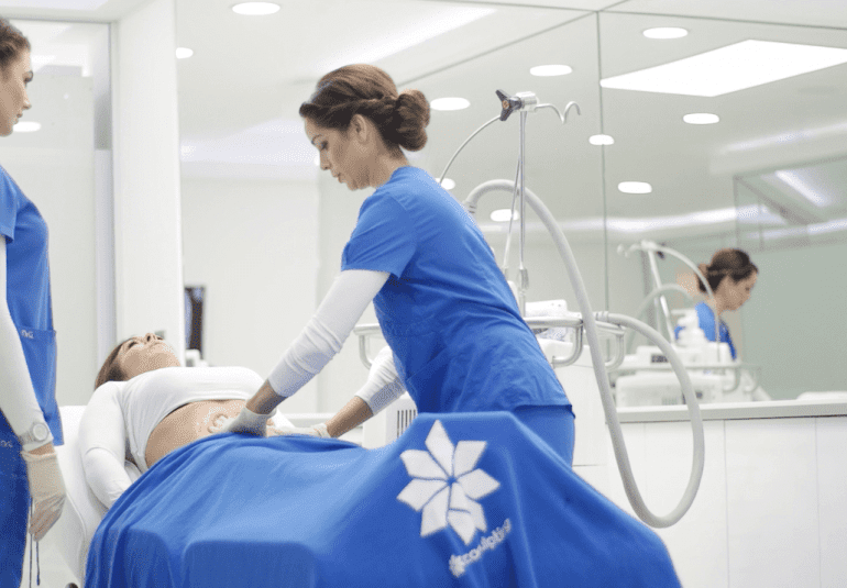 A woman during CoolSculpting treatment in Alderley edge Medispa