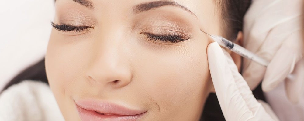 a woman during botox injection