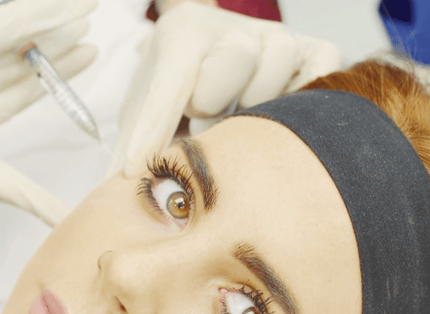 a woman during botox injection