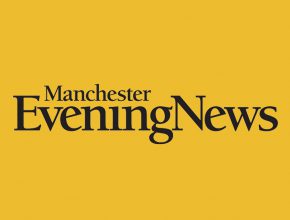 the black logo of Manchester Evening News on the yellow background