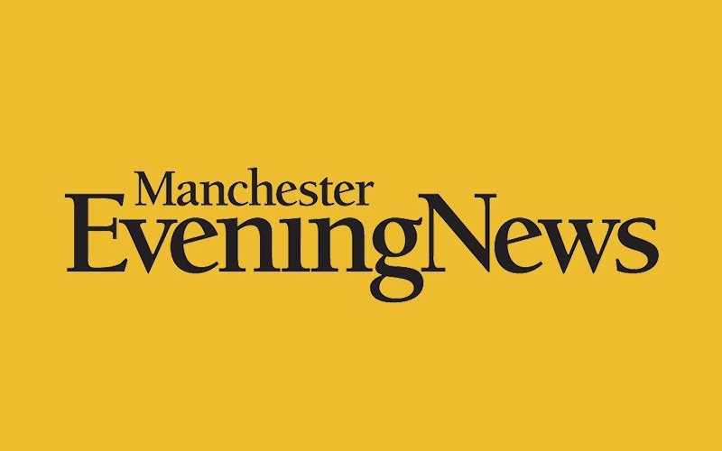 the black logo of Manchester Evening News on the yellow background