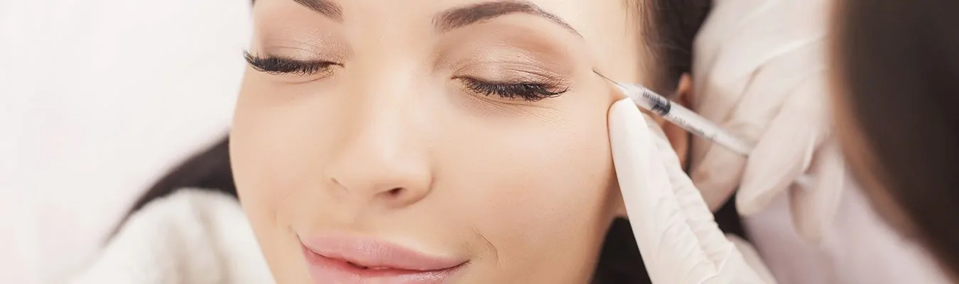 a woman during botox injection